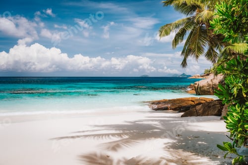 Preview: Holiday vacation visiting exotic tropical sandy beach on Mahe Island, Seychelles. Exotic travel