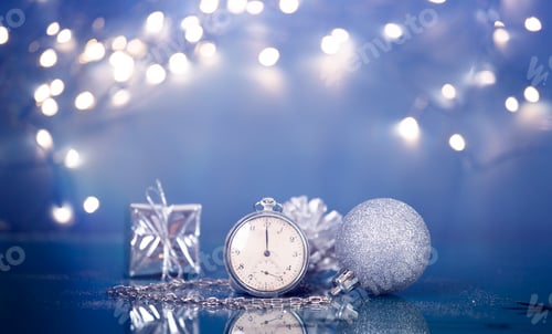 Preview: New Year's at midnight - Old clock with Christmas decoration and holiday lights