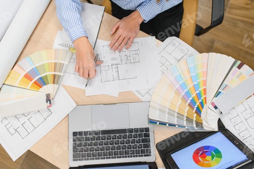 Preview: Architect designer planning color palette for interior project