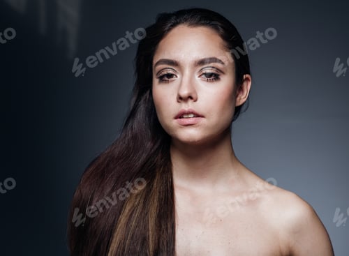Preview: Smooth hair woman long hair brunette over dark background