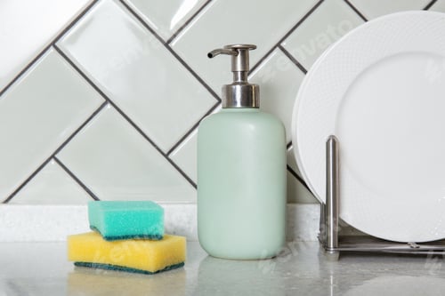 Preview: Kitchen Dishwashing Essentials on Countertop