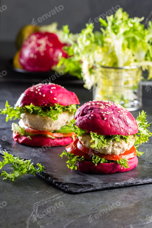 Preview: Colored purple beetroot buns and chicken burgers.