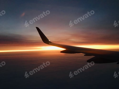 Preview: aircraft wing. sunrise