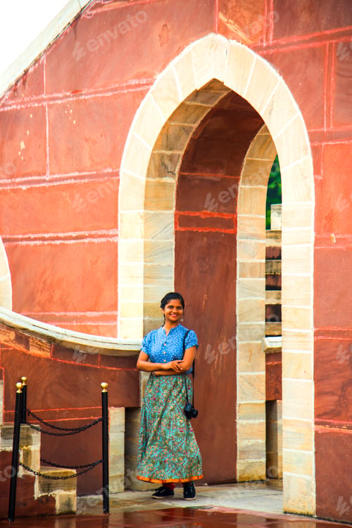 Preview: Woman tourist at the Jantar Mantar observatory, Jaipur, UNESCO World Heritage Site, India.