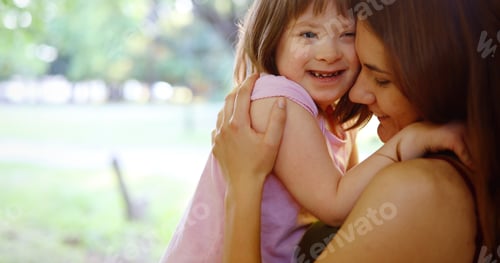 Preview: Little girl with special needs enjoy spending time with mother