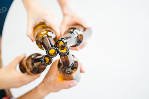 Preview: Four people cheering with bottled beer