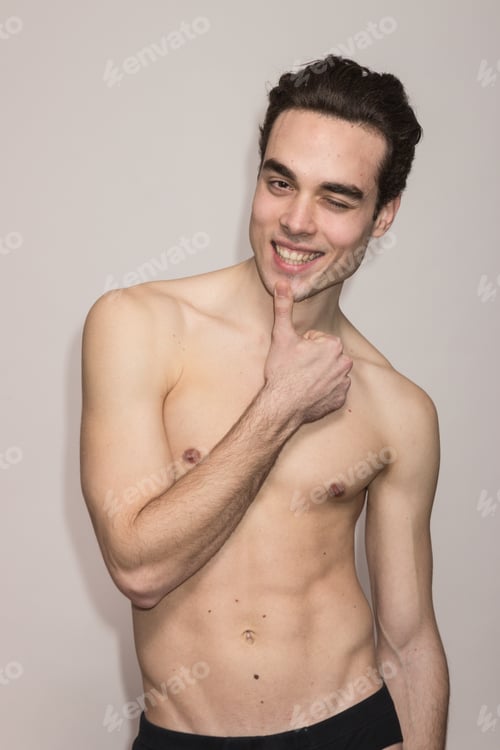 Preview: Young Adult Man Shirtless Model Posing Winking