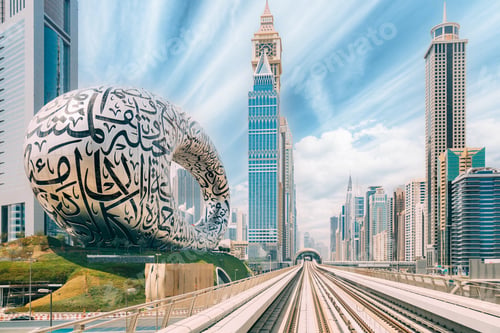Preview: Metro railway among among glass skyscrapers in Dubai. Traffic on street in Dubai. Museum of the