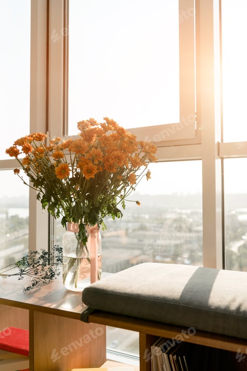 Preview: close up view of beautiful bouquet of flowers standing at window