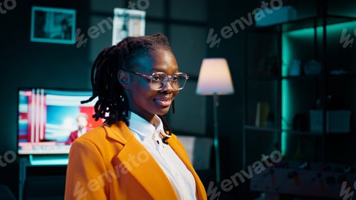 Preview: Portrait of african american college student does remote work at home