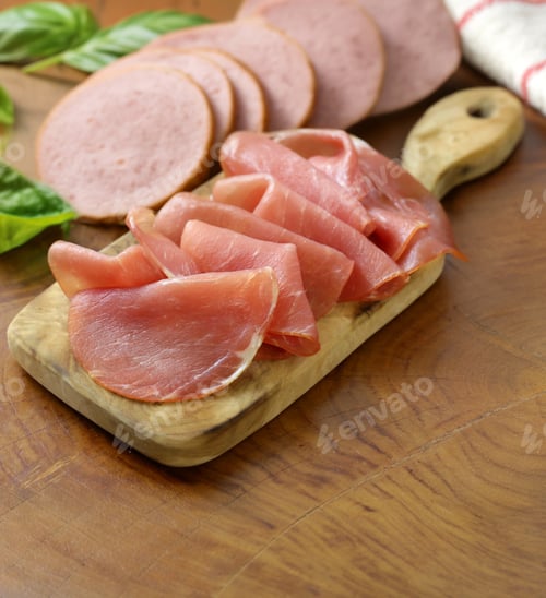 Preview: smoked ham of pork on a wooden board