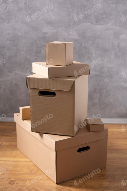Preview: Stack of cardboard box on floor. Cardboard boxes for moving to new home. Relocation concept