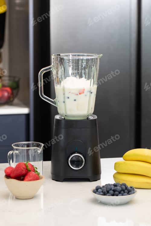 Preview: Making a fresh berry smoothie in modern kitchen setting for healthy lifestyle inspiration