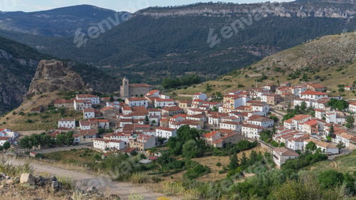 Preview: Beautiful village in the mountains with white houses called huelamo, Spain.