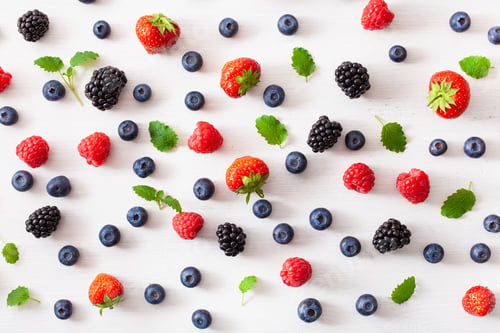 Preview: assorted berries over white background. blueberry, strawberry, r