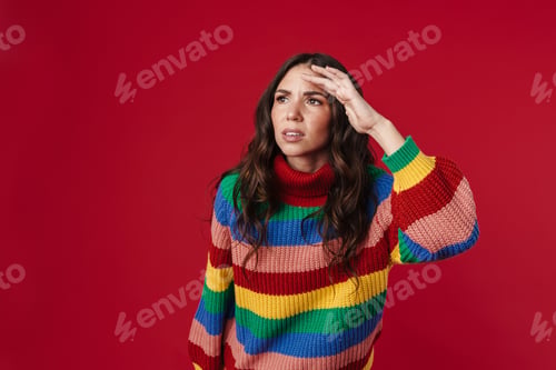 Preview: Unhappy beautiful brunette girl posing and looking at camera