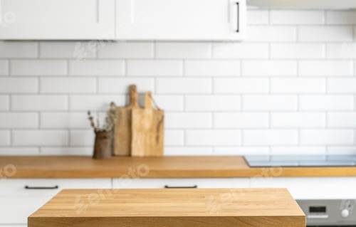 Preview: Wooden oak table with free space to display or advertise a product or food against a white kitchen