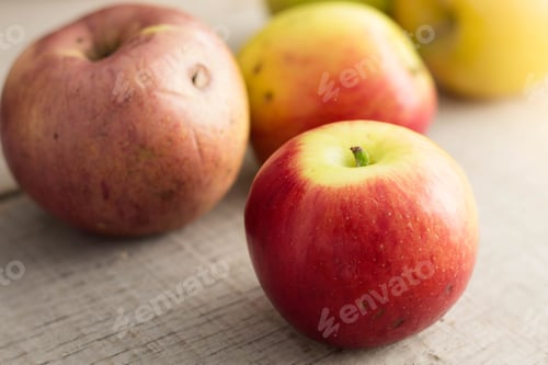 Preview: apples on wooden floor