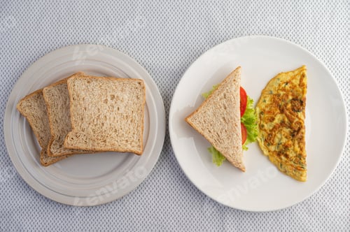 Preview: Omelette and sandwiches are in a color palette on a white background.