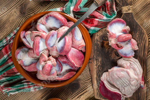 Preview: Raw uncooked turkey gizzards.