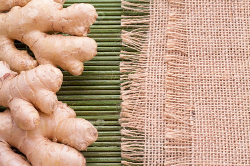 Preview: ginger roots on the table, top view