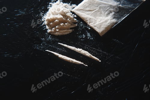 Preview: Hard drugs on black table. Close up.