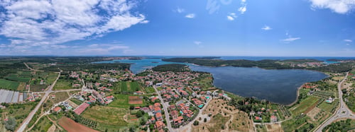Preview: Aerial view of the stunning Croatian coastal town of Pomer with its picturesque oceanfront buildings