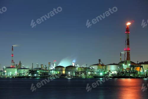 Preview: Industrial building and sea at night