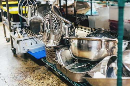 Preview: Kitchen utensils on shelves in an industrial kitchen