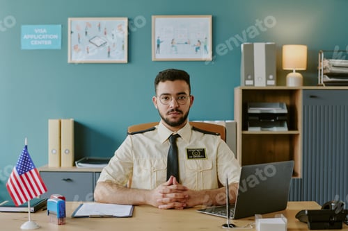 Preview: Portrait of Young Man Working at Visa Application Center