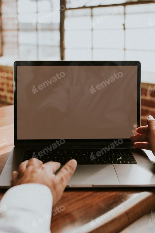 Typing on Laptop Keyboard in Office Environment