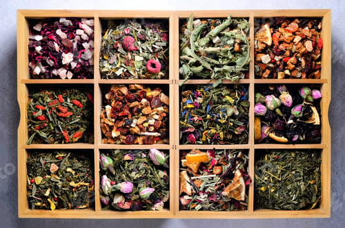 Preview: Assortment of dry tea in wooden box. Tea types: green, black, floral, herbal, mint, melissa, ginger