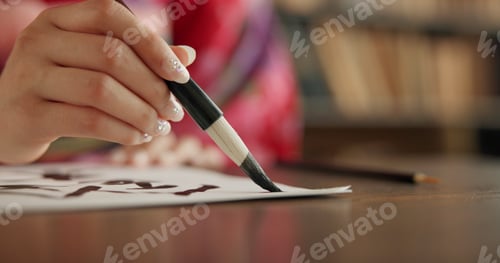 Preview: Ink, Japanese writing and person in traditional home for script, documents and paper on desk. Creat