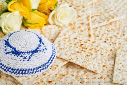 Preview: Passover celebration concept. Matzah, red kosher, white and yellow roses and walnut. Traditional rit