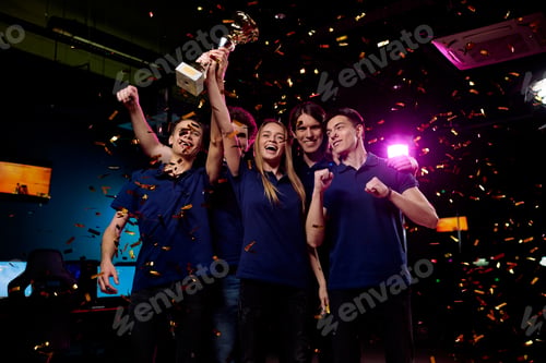 Preview: Five ecstatic young friendly video gamers expressing pride of their winning