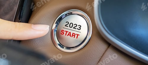 Preview: Finger press a car ignition button with 2023 START