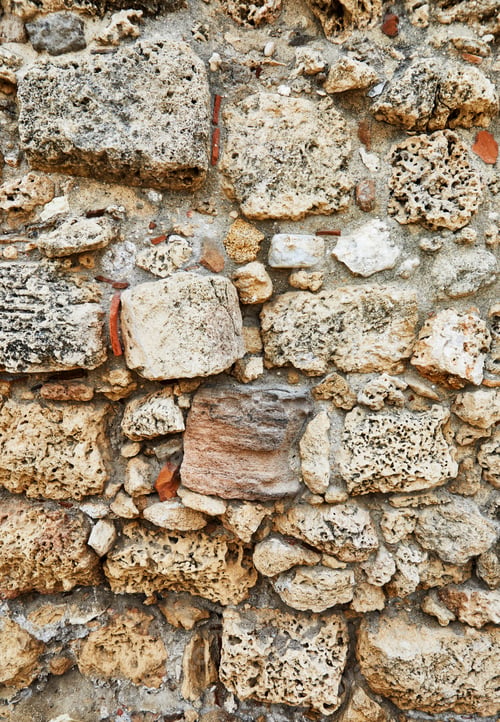 Preview: Background of the stone wall of the castle made of stones of different shapes and sizes and textures