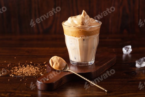 Preview: dalgona coffee in glass. trendy Instant coffee whipped with sugar and hot water