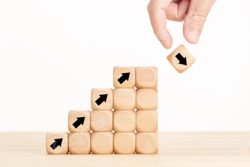 Preview: Hand and wooden block with falling arrow