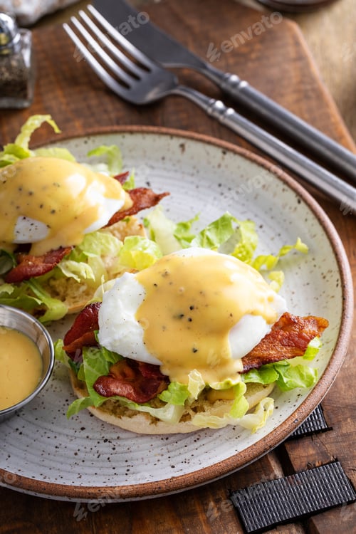 Preview: Eggs Benedict with bacon and lettuce on english muffins