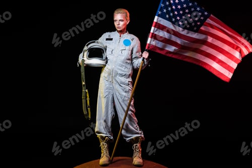 Preview: spacewoman in spacesuit holding helmet and american flag on mars