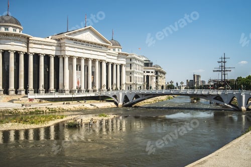 Preview: Archaeological Museum of Macedonia surrounded by the river with a bridge on it in north Macedonia