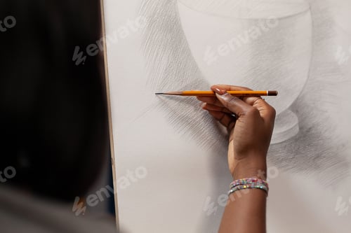 Preview: Unidentified talented female artist drawing with pencil