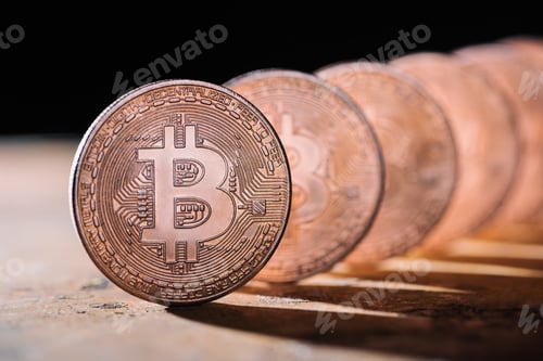Preview: close up view of arranged bitcoins on black backdrop