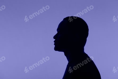 Preview: Man silhouette pose on very peri colour of 2022 background