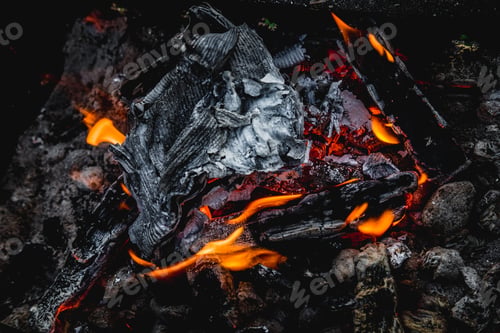 Preview: Firewood burning in the brazier. Background