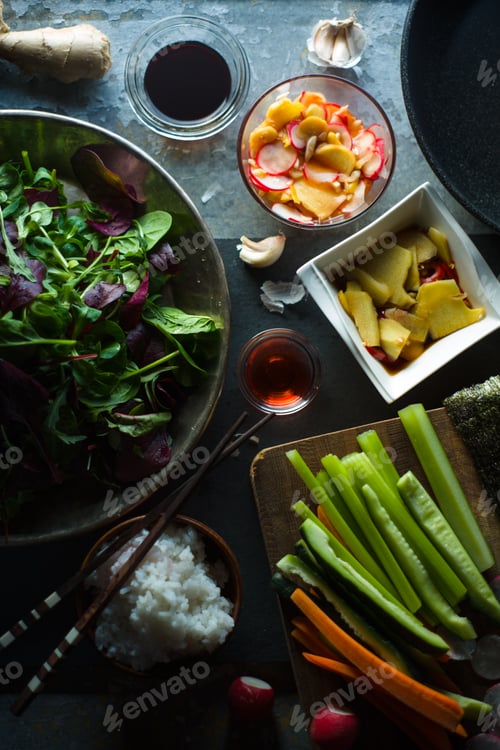Preview: Wok, rice and vegetables for cooking sushi top view. Asian cuisine