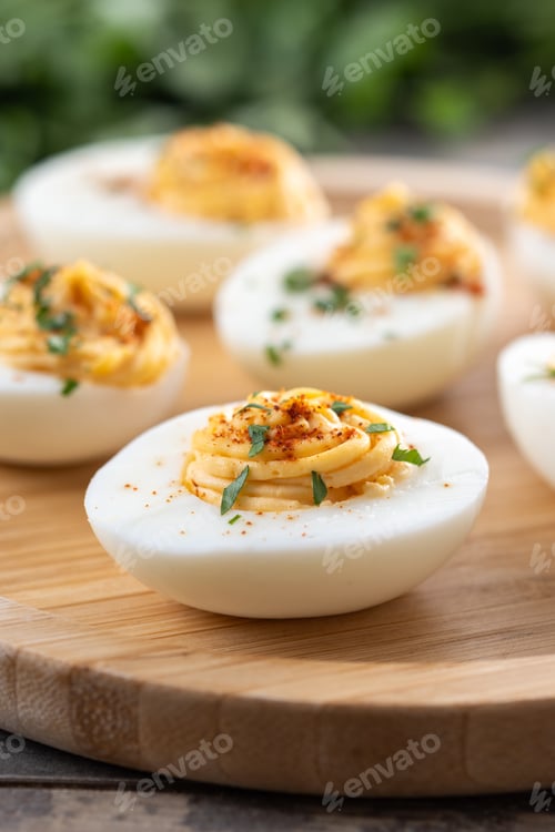 Preview: Homemade hard Boiled Deviled Eggs garnished with herbs
