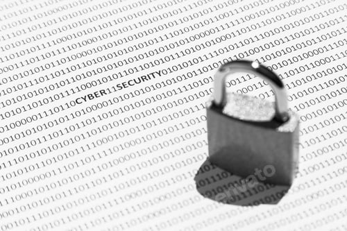 Preview: Selective focus shot of a lock on a white surface with cyber security written on it