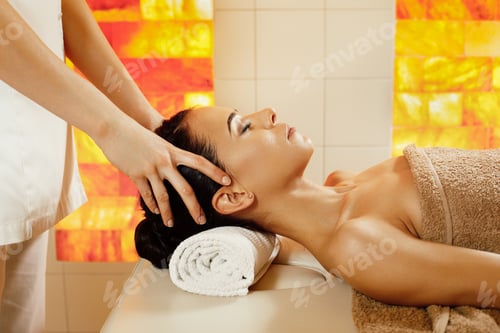 Preview: Woman having head massage in the spa salon